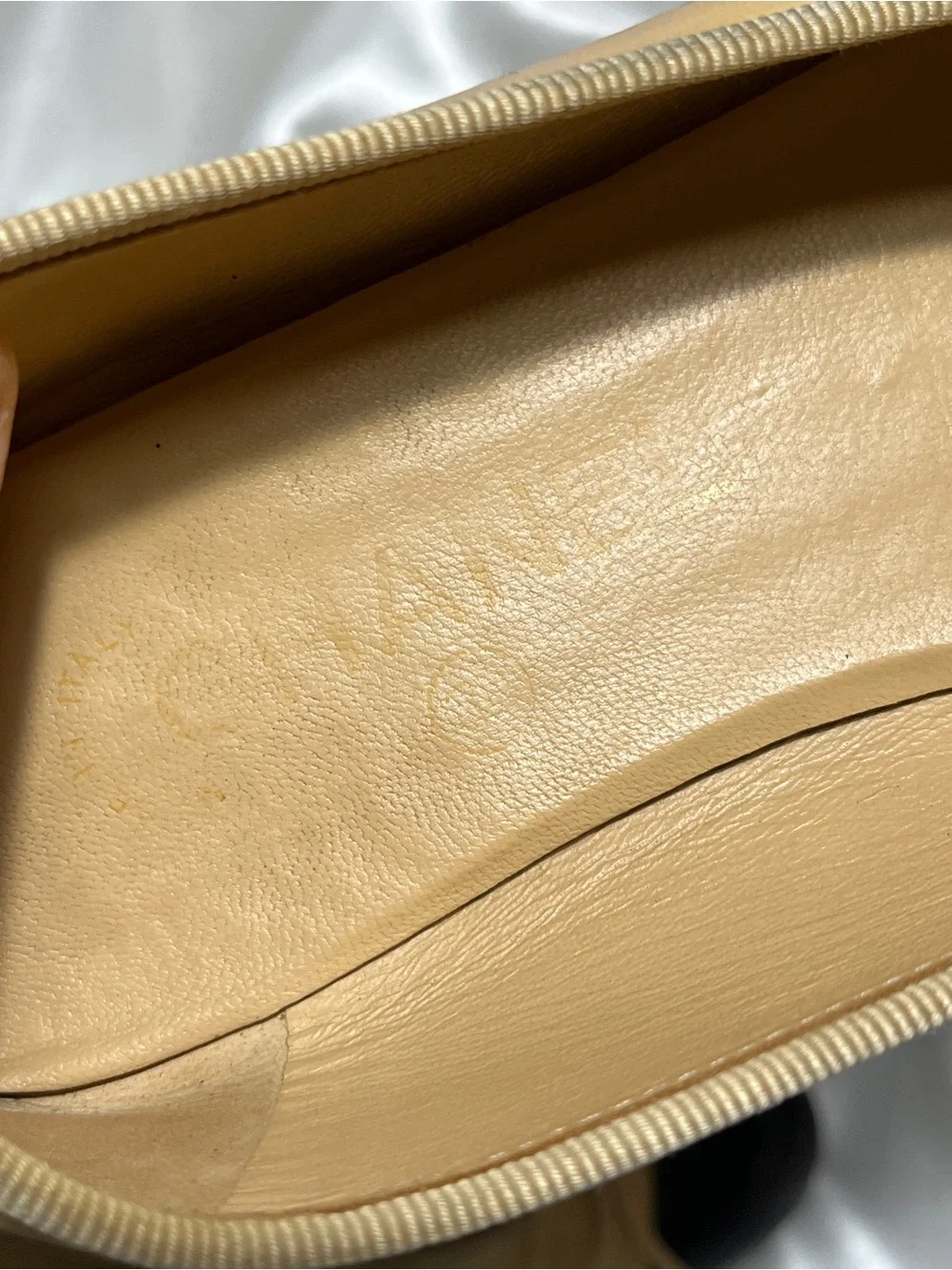 CHANEL Beige Leather Ballet Flats with Black Cap Toe and CC Logo